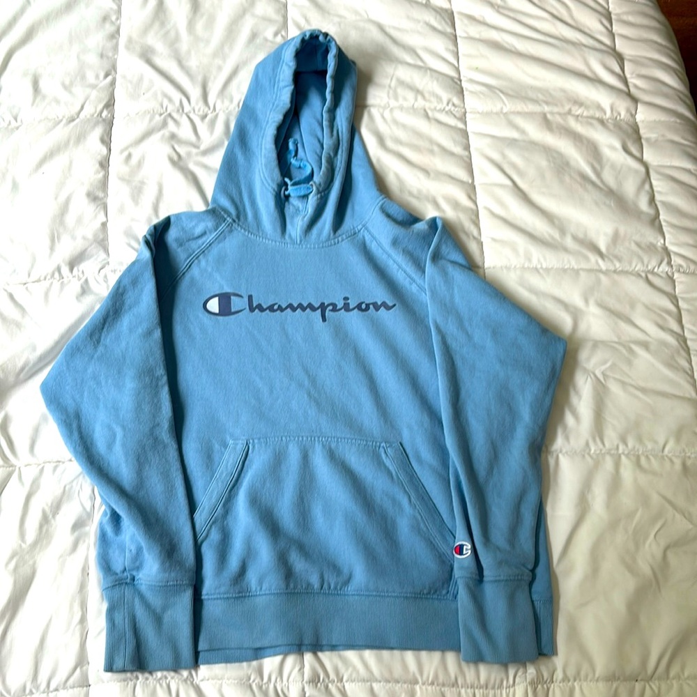 I’m selling a blue sweatshirt from champion